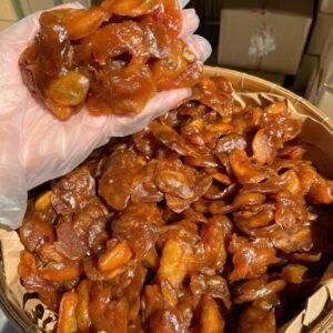 Close-up of Vietnamese Tamarind Glazed Soursop chewy fruit snack with sweet tangy tamarind coating