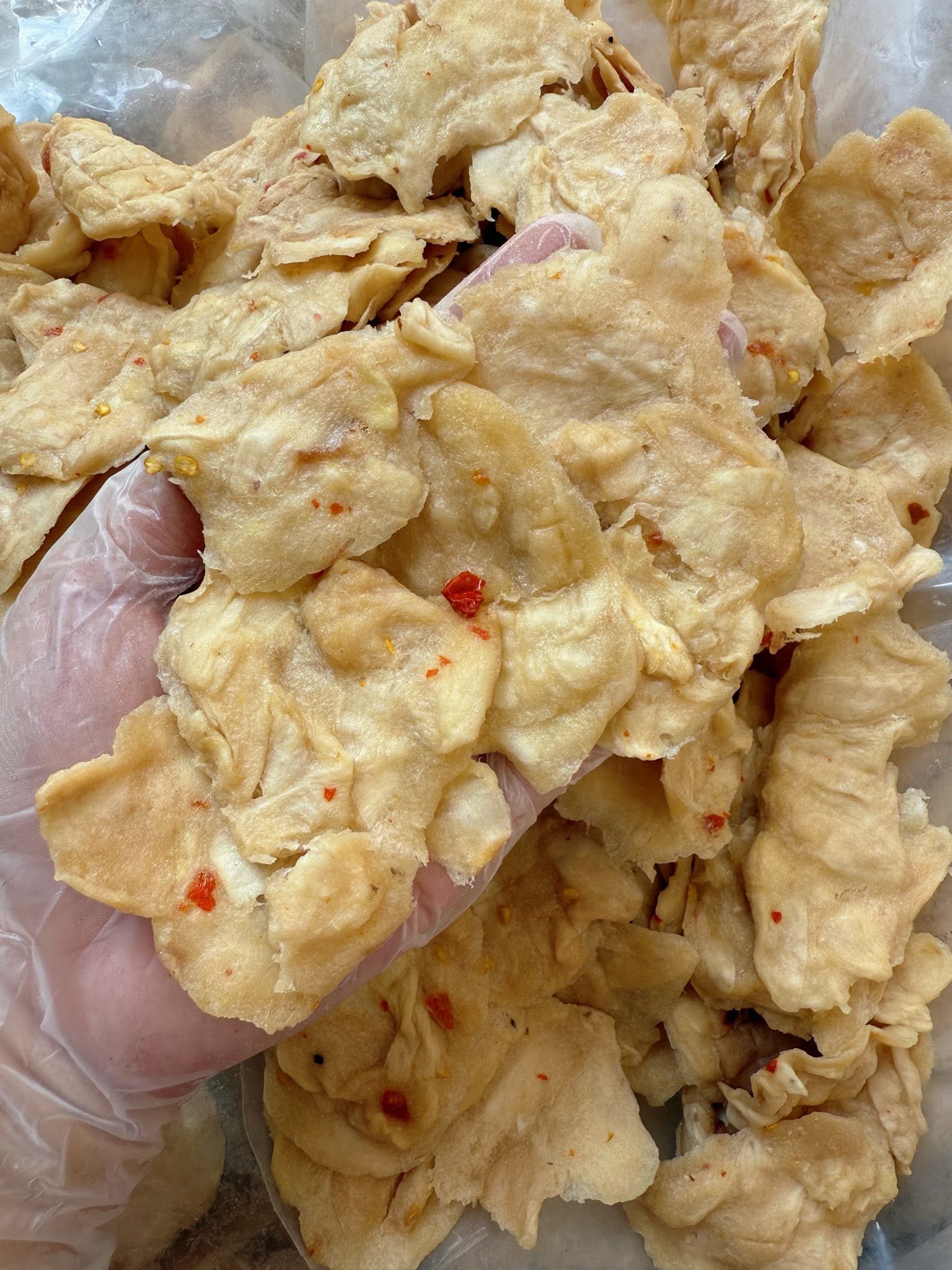 Close-up of Vietnamese Dried Soursop Snack showing its soft chewy texture and natural fruit appearance