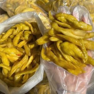 Close-up of chewy Vietnamese Green Mango Chili Salt Snack with tangy chili seasoning