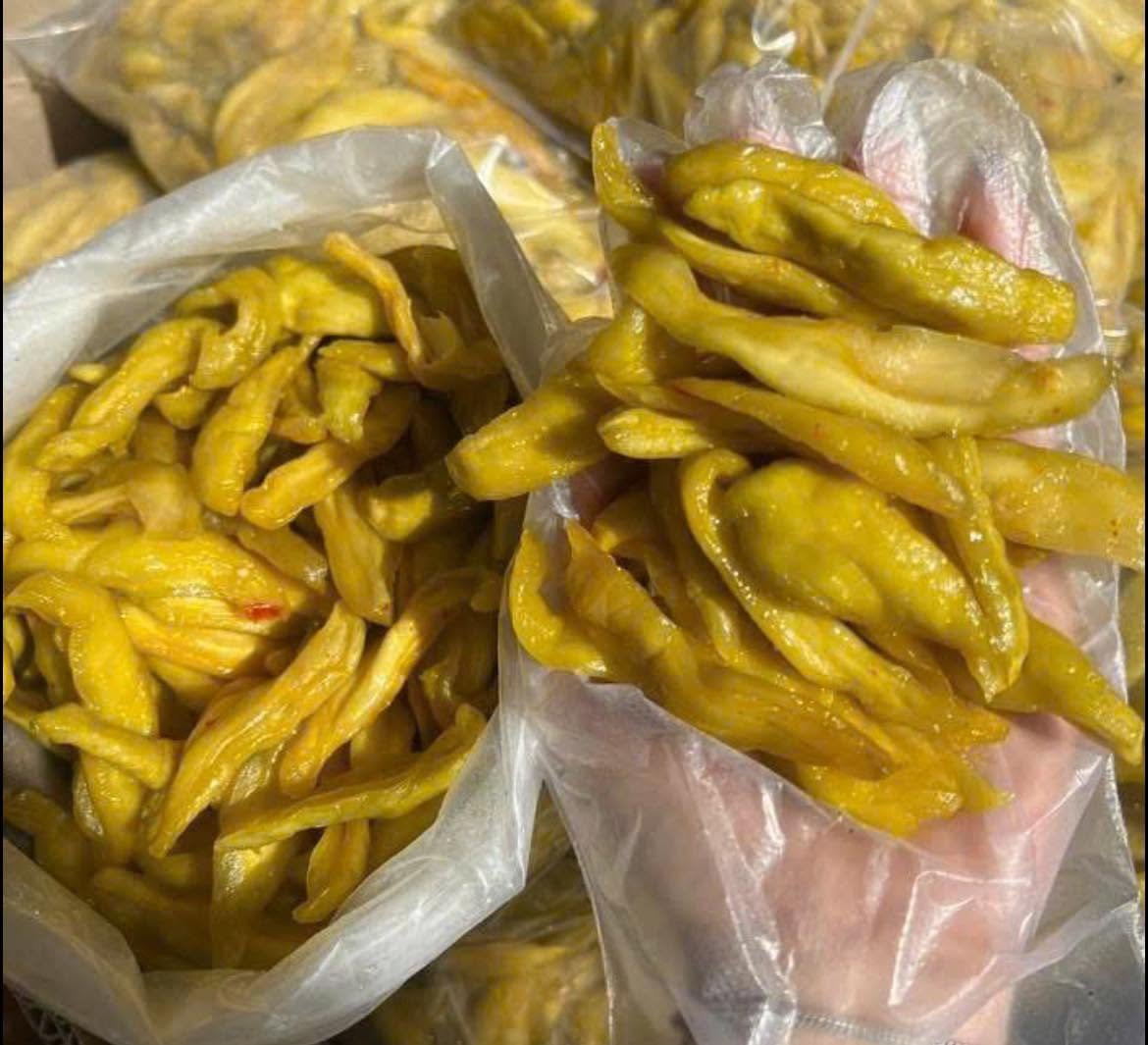 Close-up of chewy Vietnamese Green Mango Chili Salt Snack with tangy chili seasoning