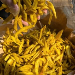 Close-up of chewy Vietnamese Green Mango Chili Salt Snack with tangy chili seasoning