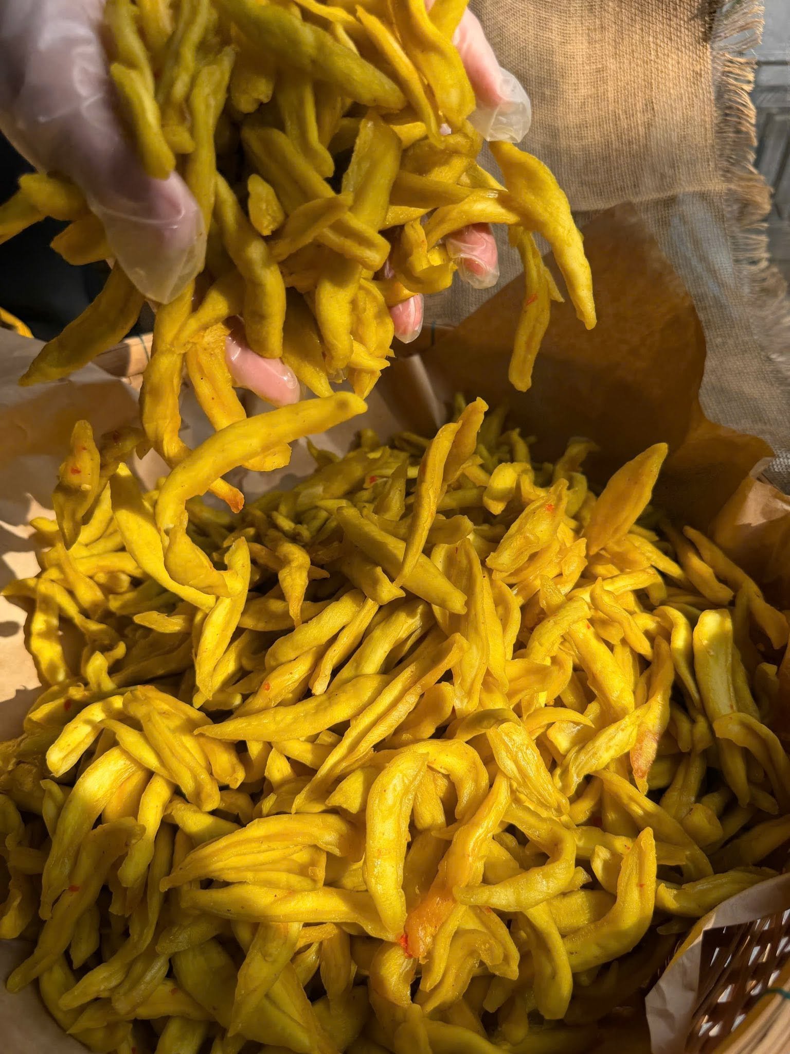 Close-up of chewy Vietnamese Green Mango Chili Salt Snack with tangy chili seasoning