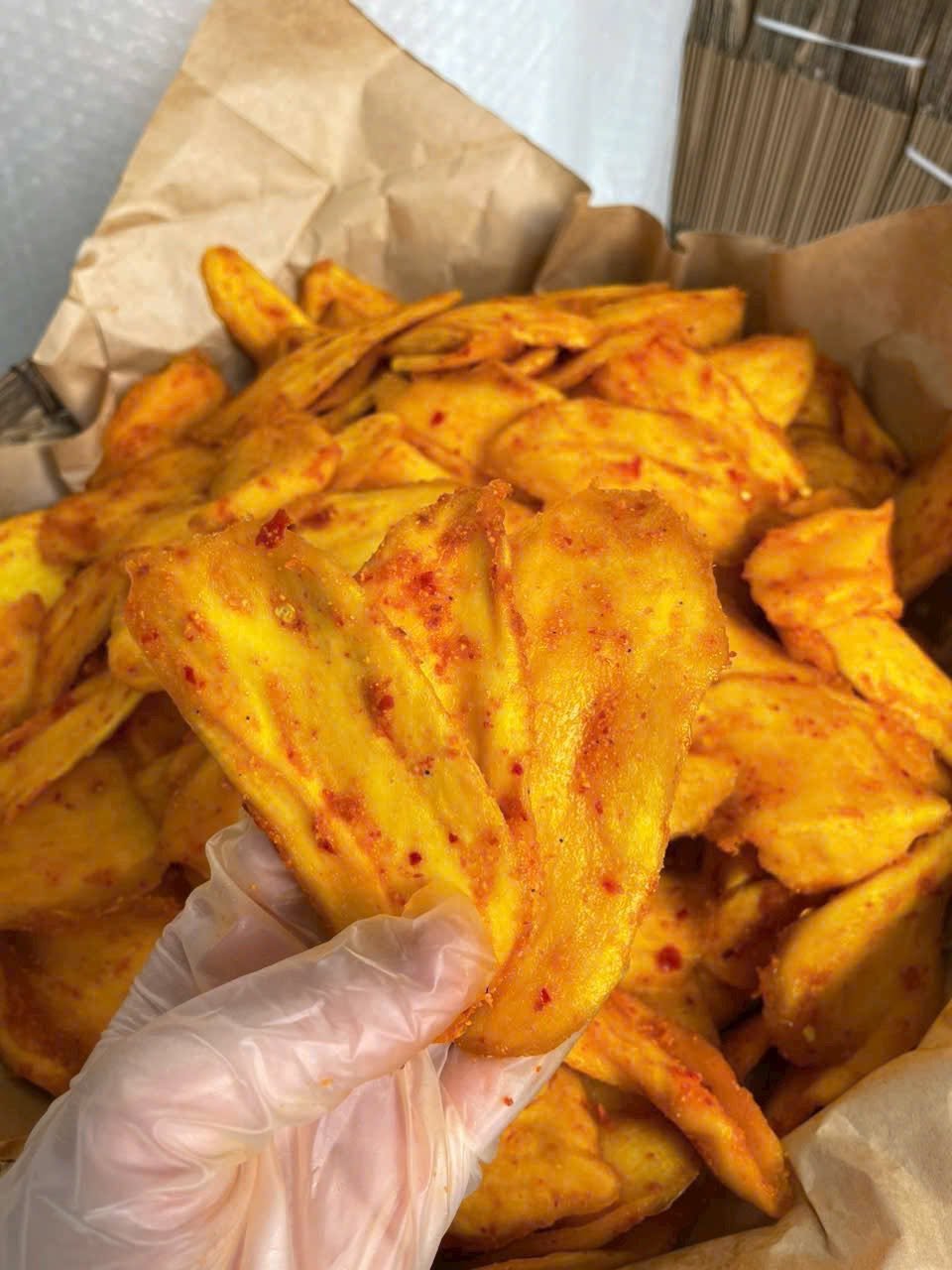 Close-up of chewy Vietnamese Soft Dried Mango with Chili Salt showing its soft texture and chili seasoning