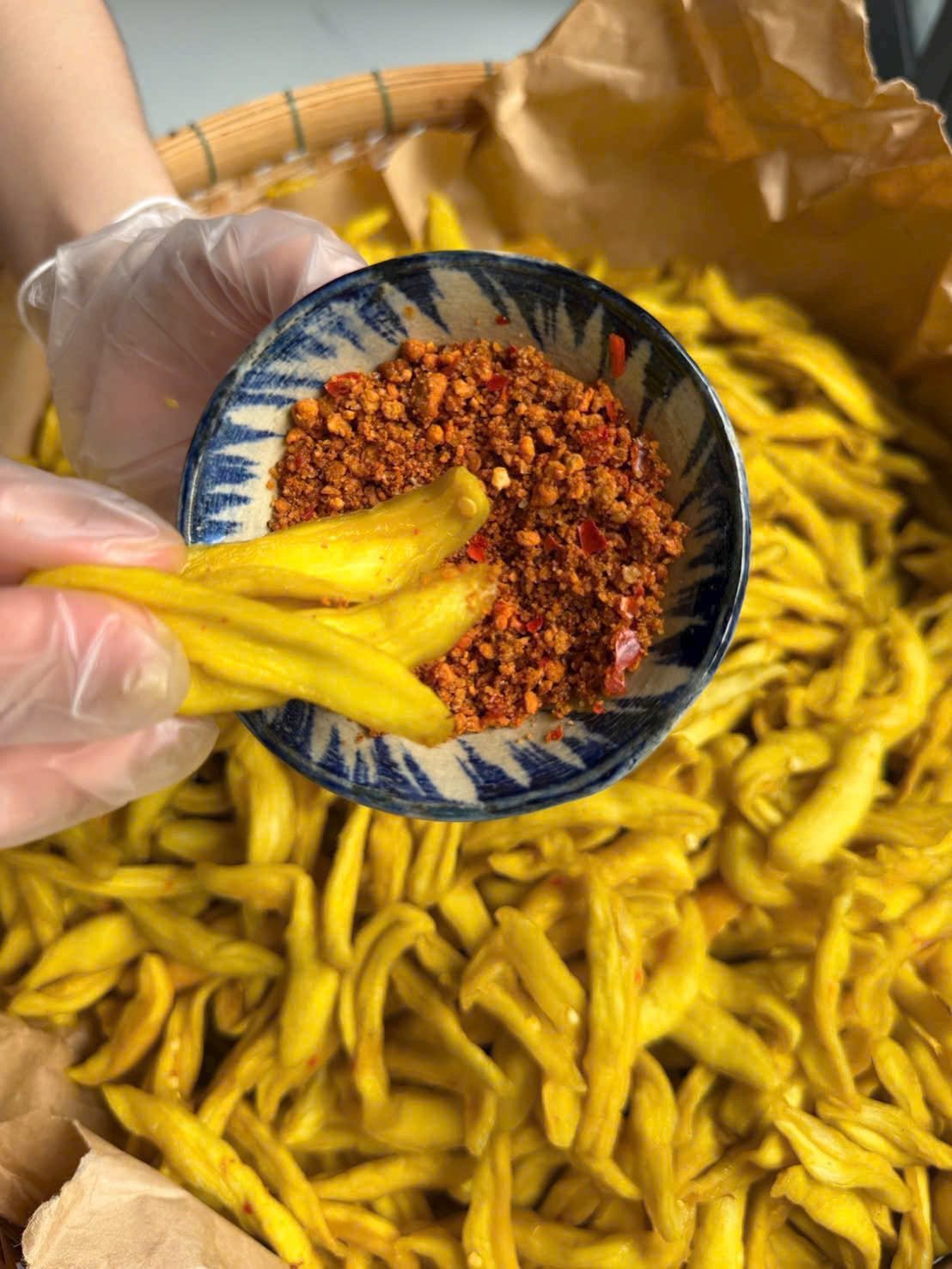 Close-up of chewy Vietnamese Green Mango Chili Salt Snack with tangy chili seasoning