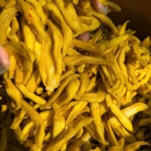 Close-up of chewy Vietnamese Green Mango Chili Salt Snack with tangy chili seasoning