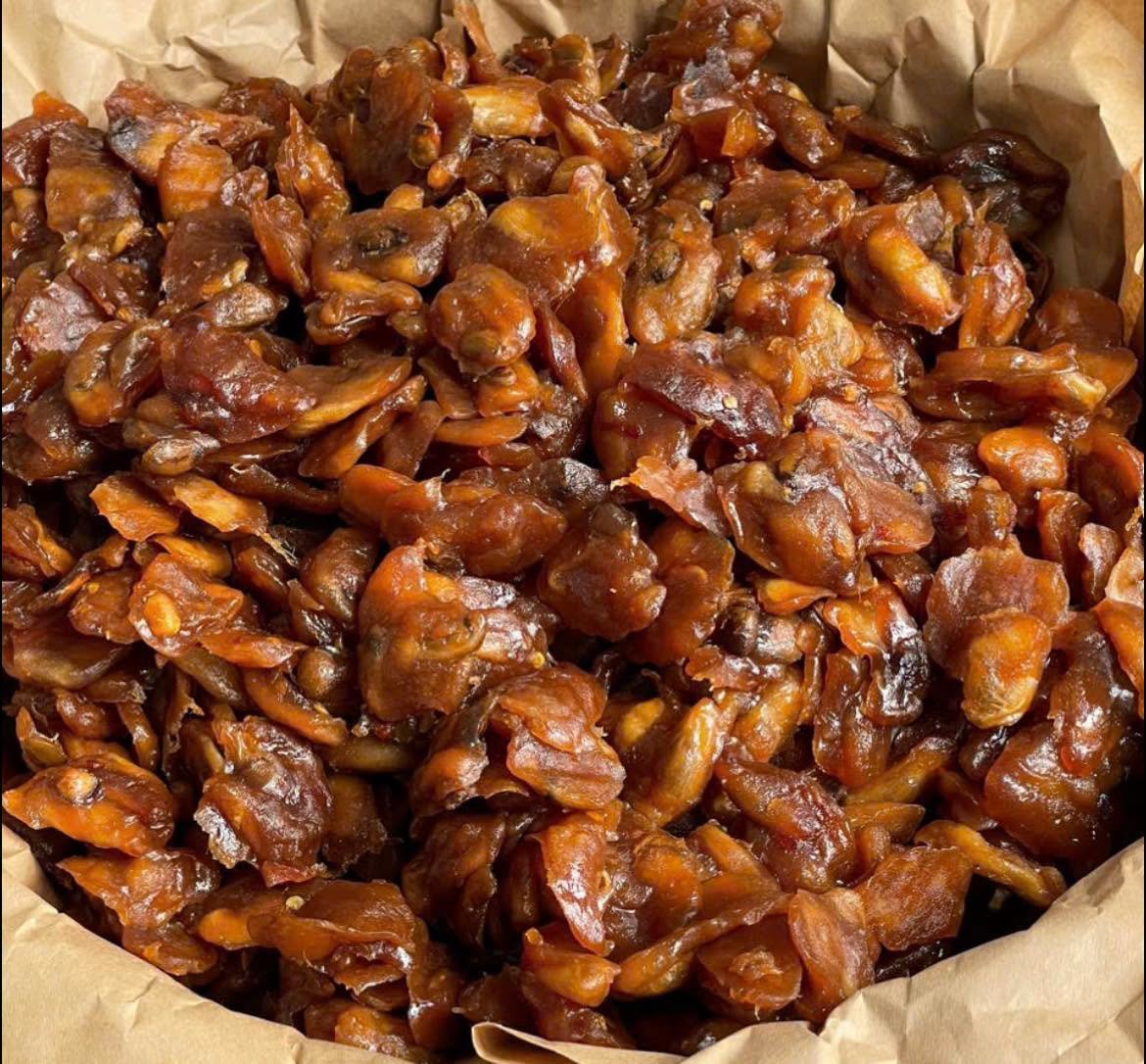 Close-up of Vietnamese Tamarind Glazed Soursop chewy fruit snack with sweet tangy tamarind coating