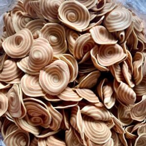 Close-up of Vietnamese Giant Coconut Palm Cookies with crispy spiral layers and rich coconut flavor