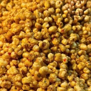 Close-up of crispy roasted Vietnamese Chili Fish Sauce Corn Snack with savory spicy seasoning