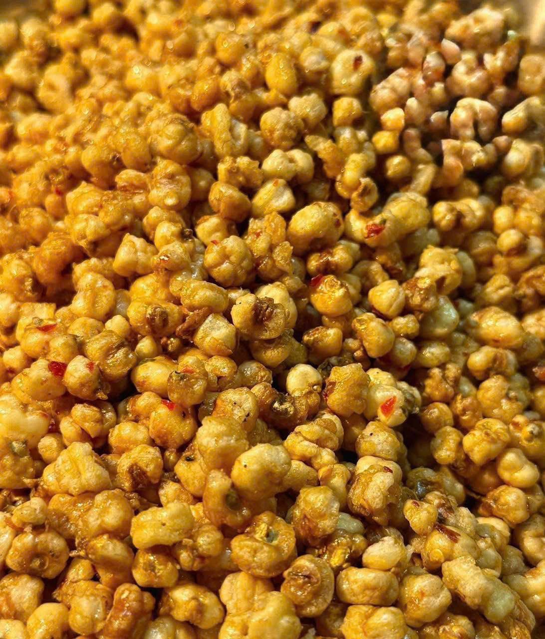 Close-up of crispy roasted Vietnamese Chili Fish Sauce Corn Snack with savory spicy seasoning