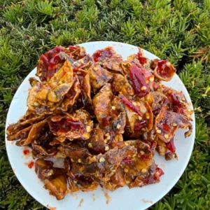 Close-up of Vietnamese Tamarind Glazed Dried Squid showing tender chewy texture and glossy tamarind glaze