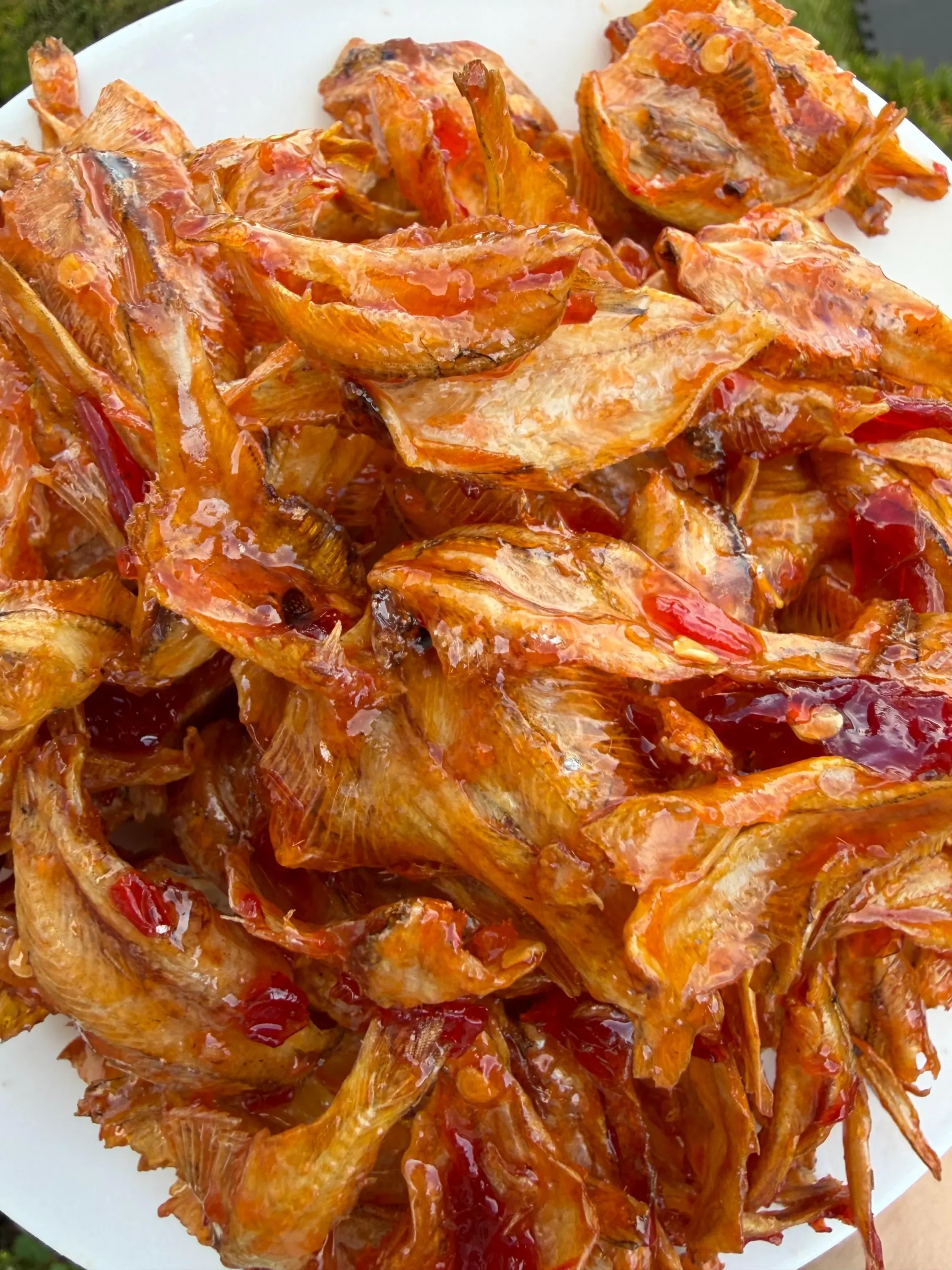 Close up of Vietnamese Dried Anchovy with Passion Fruit Sauce