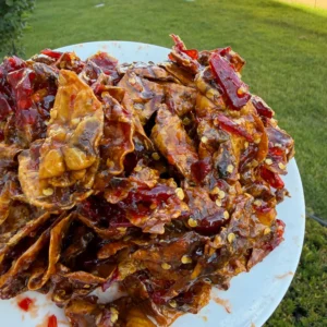 Close-up of Vietnamese Tamarind Glazed Dried Squid showing tender chewy texture and glossy tamarind glaze